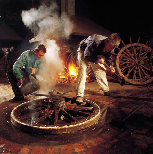 Skilled workers then use the factory-produced parts to construct the wheel.